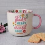 A Glad Heart Makes a Cheerful Face Ceramic Mug - Image 3